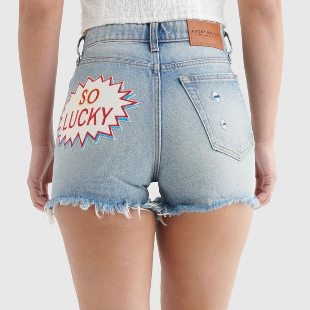 Lucky Brand High Rise Cut Off Jean Short "SO LUCKY" Comic graphic patch detail